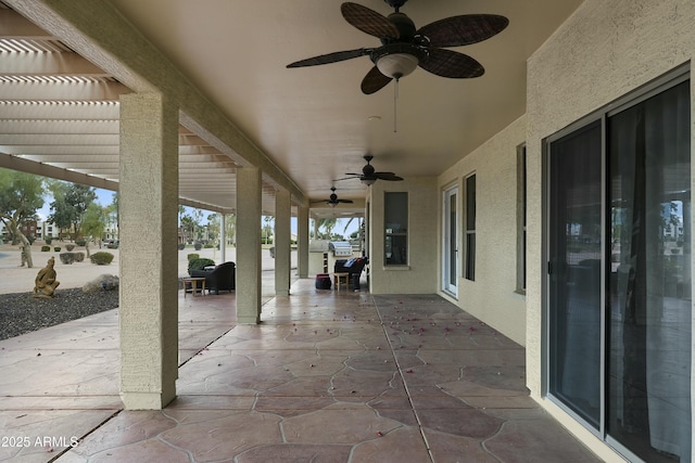 view of patio with a pergola and a ceiling fan