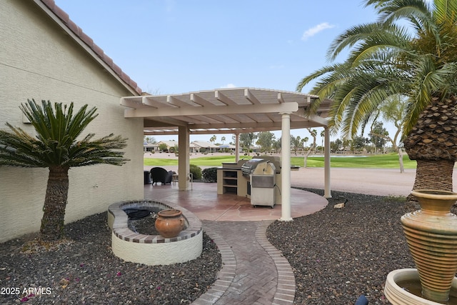 view of patio with an outdoor fire pit and a pergola