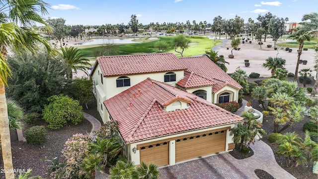 birds eye view of property featuring golf course view