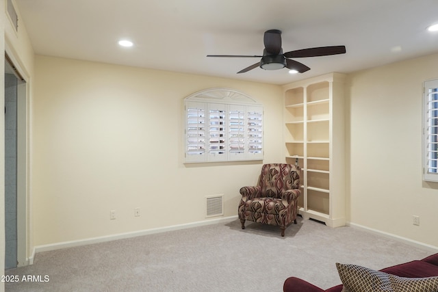 sitting room with a ceiling fan, carpet, visible vents, baseboards, and recessed lighting