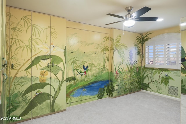 playroom with a ceiling fan, visible vents, carpet floors, and baseboards