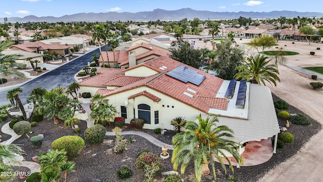 birds eye view of property featuring a residential view and a mountain view