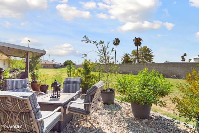 view of patio featuring fence