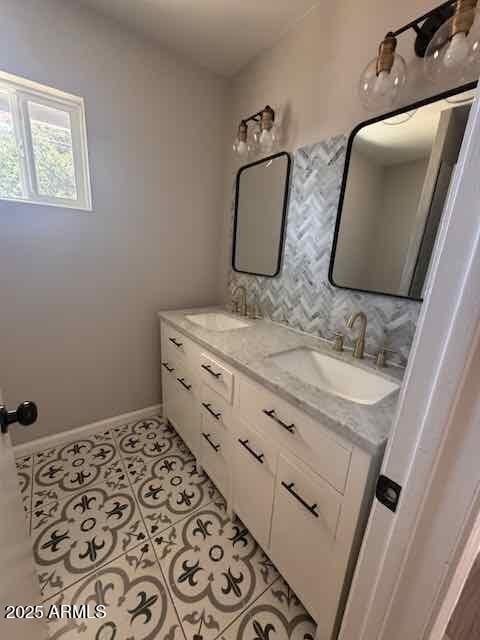 7201 N 26th Ln, Phoenix, AZ 85051 - bathroom featuring tile patterned flooring and double vanity