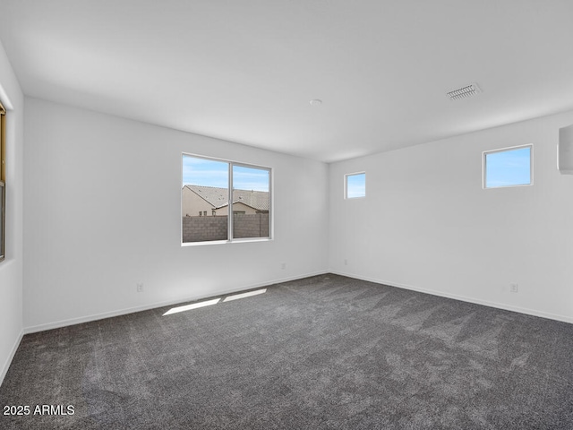 17815 W Denton Ave, Litchfield Park, AZ 85340 - spare room with dark carpet and baseboards