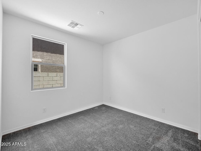17815 W Denton Ave, Litchfield Park, AZ 85340 - spare room with dark carpet and baseboards