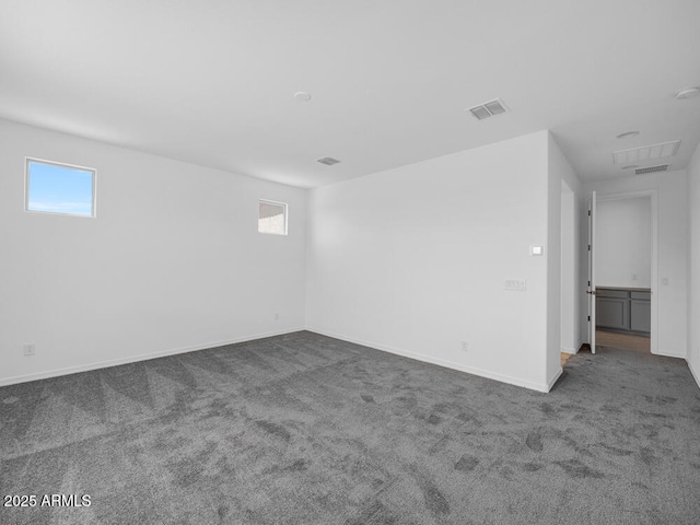 17815 W Denton Ave, Litchfield Park, AZ 85340 - carpeted spare room featuring healthy amount of natural light and baseboards