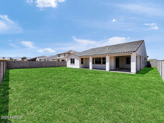 17815 W Denton Ave, Litchfield Park, AZ 85340 - back of house featuring a patio area, stucco siding, and a tile roof