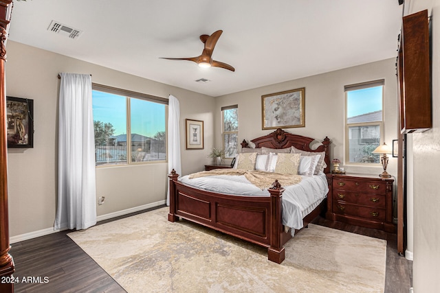 bedroom featuring wood-type flooring and ceiling fan