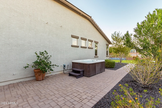 view of patio featuring a hot tub