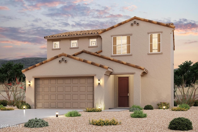 2583 E Music Mountain Ave, Apache Junction, AZ 85119 - mediterranean / spanish home with a tile roof, a garage, concrete driveway, and stucco siding