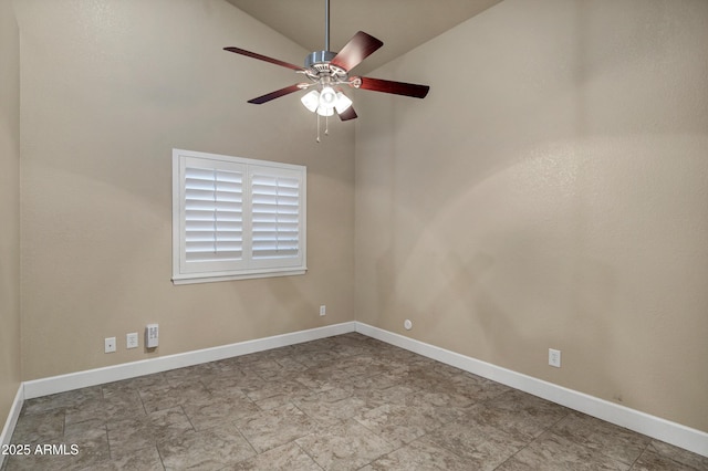 unfurnished room featuring ceiling fan and lofted ceiling