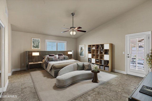 bedroom with multiple windows, access to exterior, vaulted ceiling, and ceiling fan