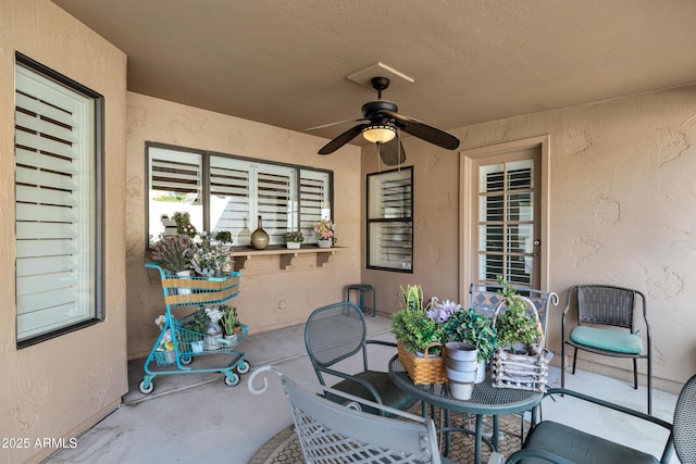 view of patio with ceiling fan