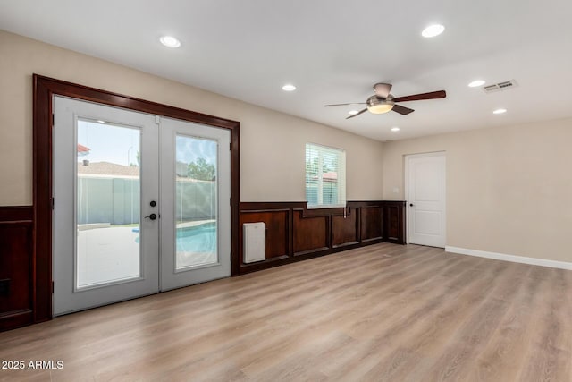 1535 E Kenwood St, Mesa, AZ 85203 - unfurnished living room with french doors, light wood-style floors, a ceiling fan, and recessed lighting