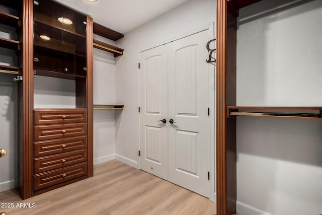 1535 E Kenwood St, Mesa, AZ 85203 - walk in closet with light wood-type flooring
