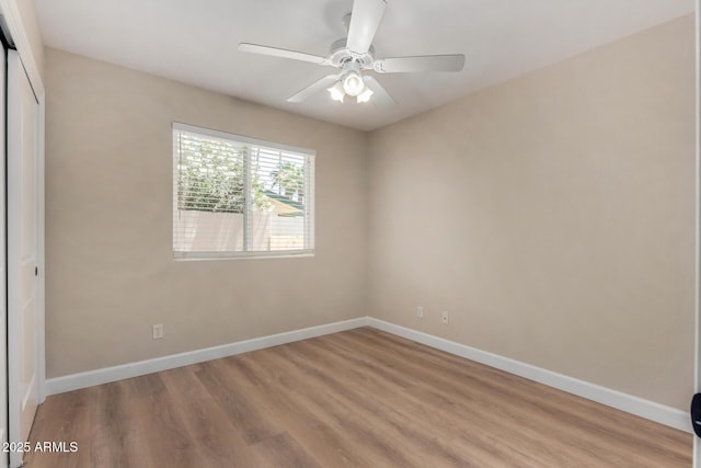 1535 E Kenwood St, Mesa, AZ 85203 - spare room featuring light wood finished floors, baseboards, and a ceiling fan