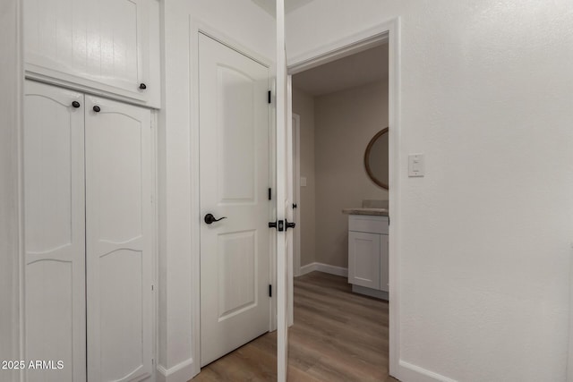 1535 E Kenwood St, Mesa, AZ 85203 - hallway featuring light wood-type flooring and baseboards
