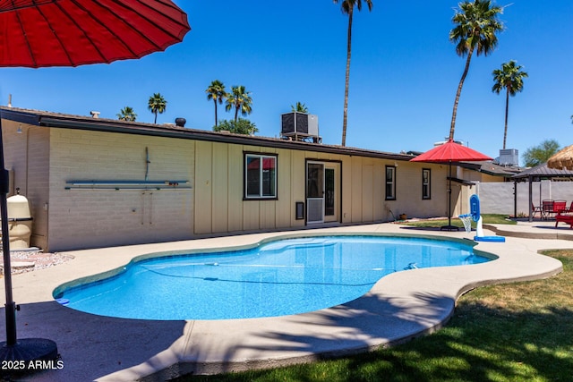 1535 E Kenwood St, Mesa, AZ 85203 - view of swimming pool with a patio area and central AC