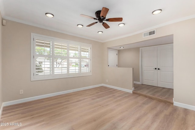 1535 E Kenwood St, Mesa, AZ 85203 - empty room featuring crown molding, baseboards, a ceiling fan, light wood-type flooring, and recessed lighting