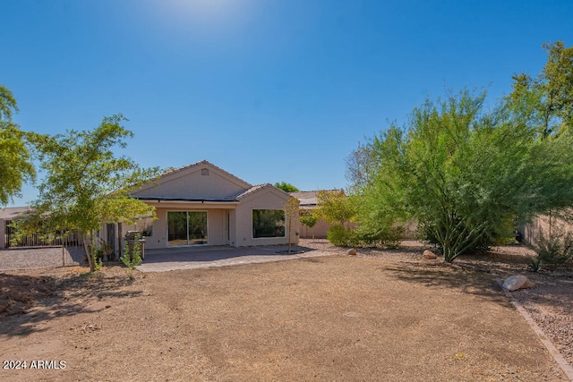 back of house featuring a patio