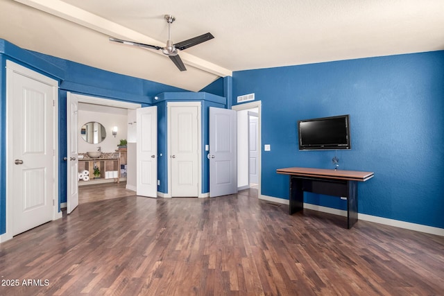 23948 W Jomax Rd, Wittmann, AZ 85361 - unfurnished living room featuring wood finished floors, baseboards, and a ceiling fan