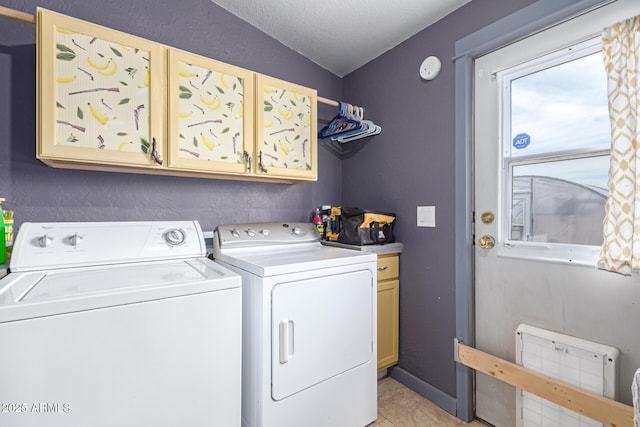 23948 W Jomax Rd, Wittmann, AZ 85361 - laundry area featuring cabinet space, washer and clothes dryer, light tile patterned floors, and a textured ceiling