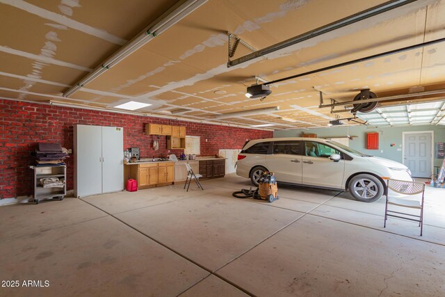 23948 W Jomax Rd, Wittmann, AZ 85361 - garage featuring a garage door opener