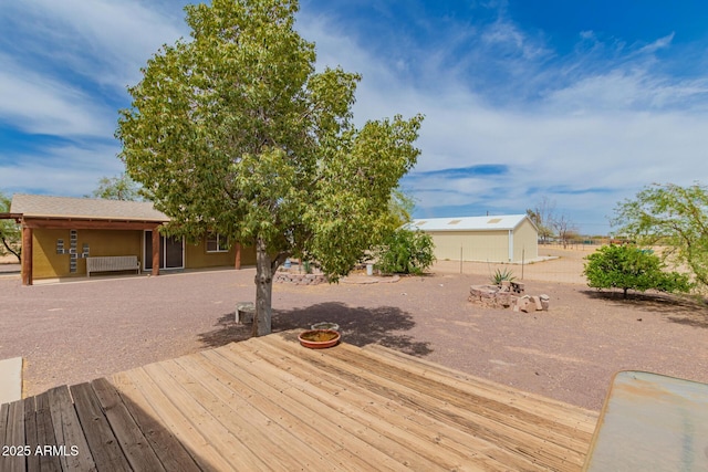 23948 W Jomax Rd, Wittmann, AZ 85361 - deck with an outbuilding
