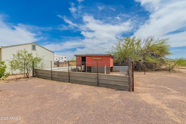 23948 W Jomax Rd, Wittmann, AZ 85361 - view of yard with an outdoor structure and an exterior structure