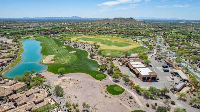 drone / aerial view with a water and mountain view