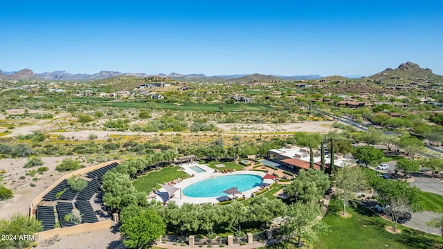 birds eye view of property featuring a mountain view