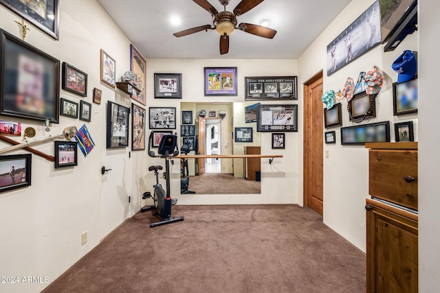 workout area with carpet flooring and ceiling fan