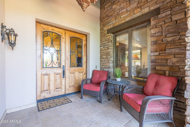 property entrance with covered porch