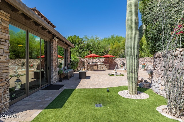 view of yard with a patio