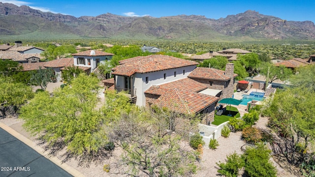 bird's eye view with a mountain view