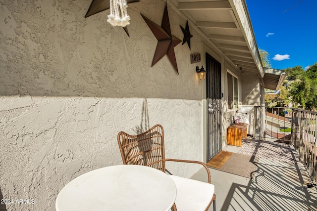 view of patio / terrace with a balcony