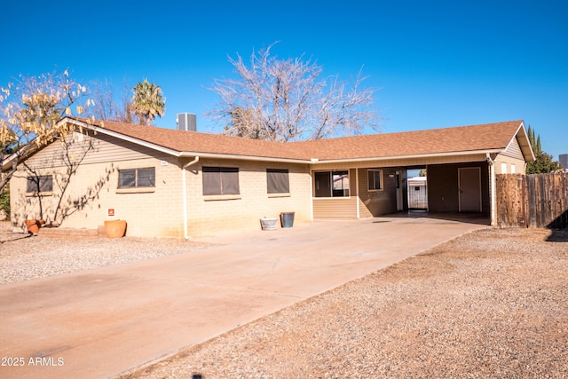 view of front facade with a carport