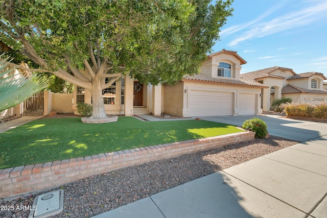 mediterranean / spanish-style home featuring driveway, stucco siding, a tile roof, fence, and a front yard