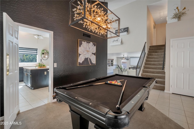 game room with pool table, ceiling fan, and light tile patterned flooring