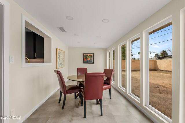 dining room with baseboards, visible vents, and recessed lighting