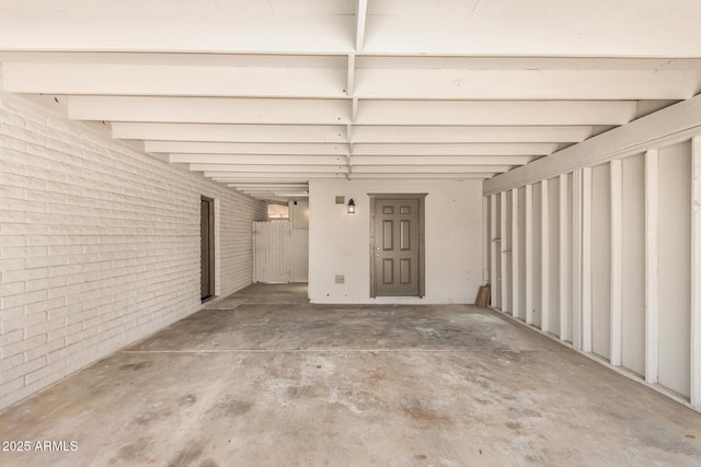 interior space featuring an attached carport