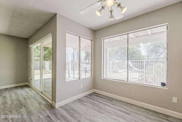 4627 E Mcneil St, Phoenix, AZ 85044 - unfurnished room with wood finished floors and baseboards