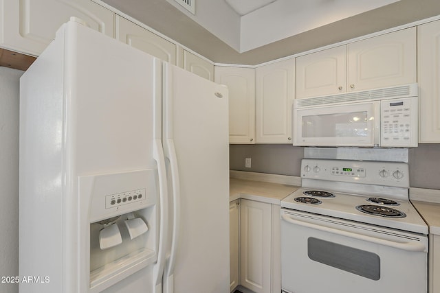 4627 E Mcneil St, Phoenix, AZ 85044 - kitchen with white appliances, light countertops, and white cabinets