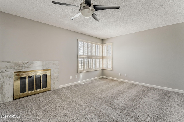 4627 E Mcneil St, Phoenix, AZ 85044 - unfurnished living room with ceiling fan, carpet, a tiled fireplace, a textured ceiling, and baseboards