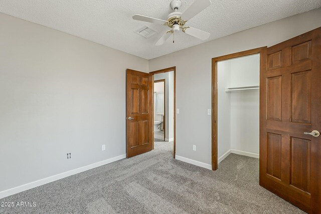 4627 E Mcneil St, Phoenix, AZ 85044 - unfurnished bedroom featuring carpet, a closet, baseboards, a spacious closet, and a textured ceiling