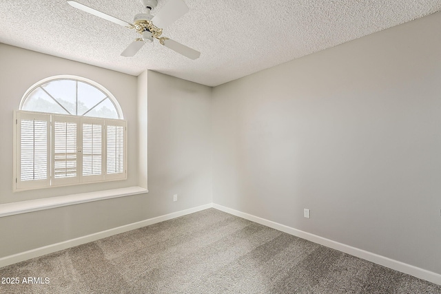 4627 E Mcneil St, Phoenix, AZ 85044 - spare room featuring carpet floors, a textured ceiling, a ceiling fan, and baseboards