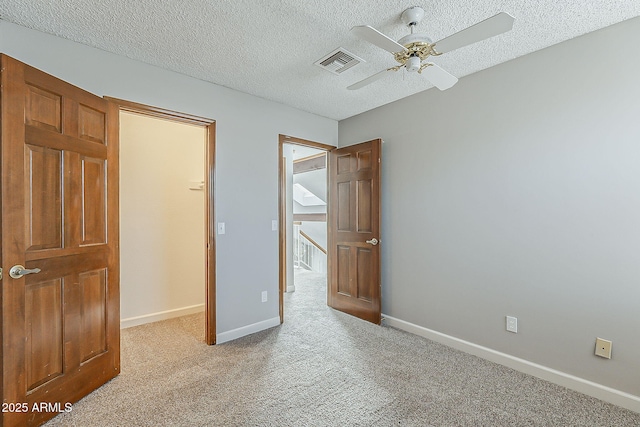 4627 E Mcneil St, Phoenix, AZ 85044 - unfurnished bedroom with carpet, baseboards, a textured ceiling, and ceiling fan