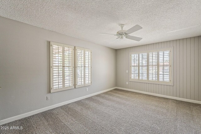 4627 E Mcneil St, Phoenix, AZ 85044 - carpeted empty room featuring a ceiling fan, baseboards, and a textured ceiling