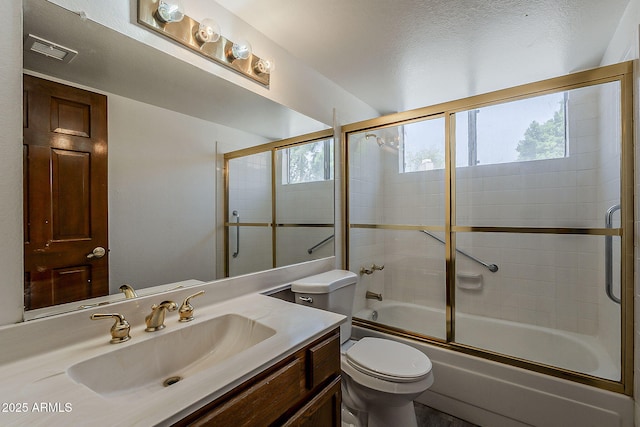 4627 E Mcneil St, Phoenix, AZ 85044 - full bath featuring plenty of natural light, toilet, bath / shower combo with glass door, and vanity